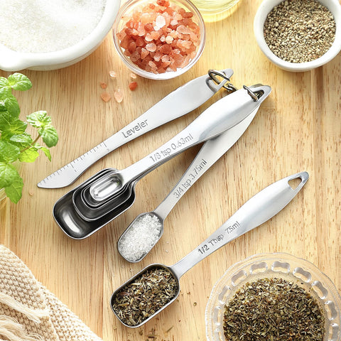 Spring Chef cups and spoons beside a ruler showing compact size and clear scale
