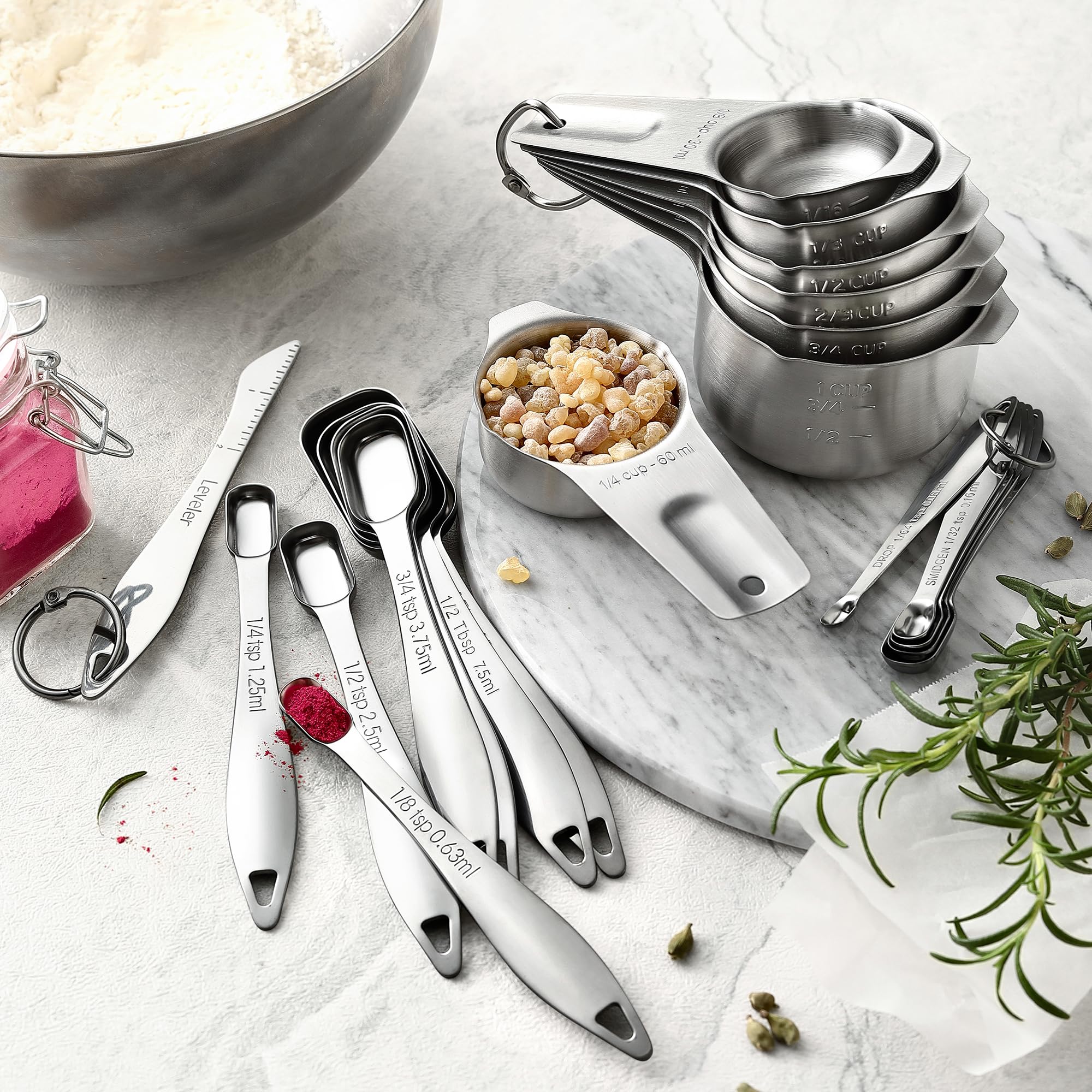 Spring Chef narrow spoons inside a spice jar to reduce waste and save time