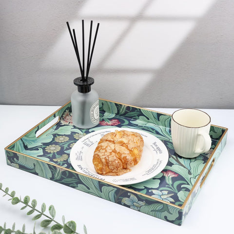 Spsyrine on a coffee table with cups and plates, enhances casual entertaining