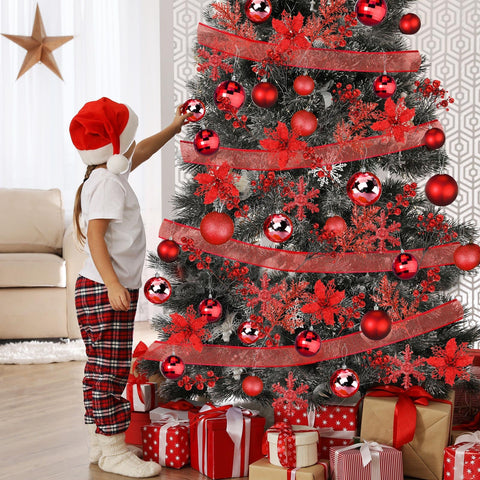 Sratte arranged three-size red balls creating layered tree depth