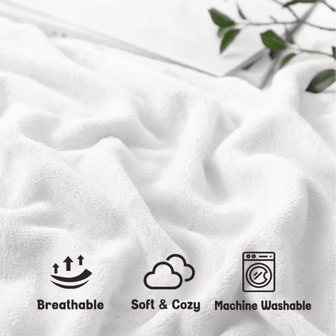 Sruemiul blanket beside a chair illustrating 50x60 inch size and scale