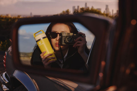 STANLEY commuter lifestyle scene showing mug in backpack ready for travel