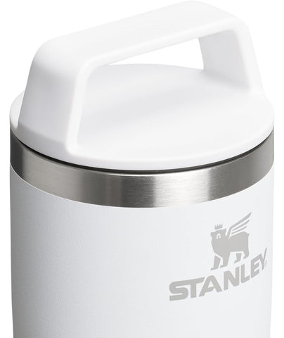 STANLEY mug next to smartphone showing 20 oz size and scale