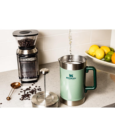 STANLEY French Press on campsite table showing rugged build and outdoor热 retention benefit