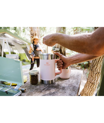 STANLEY French Press beside a mug showing 48 oz scale and travel-ready capacity benefit