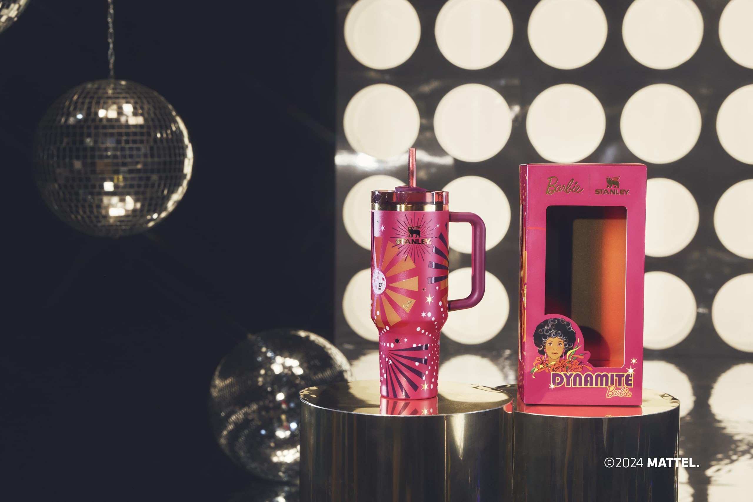 STANLEY Quencher staged with Barbie memorabilia emphasizing commemorative design