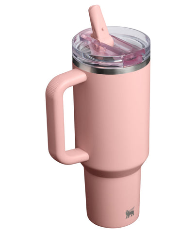 STANLEY flip straw action image showing quick sip access and spill prevention benefit