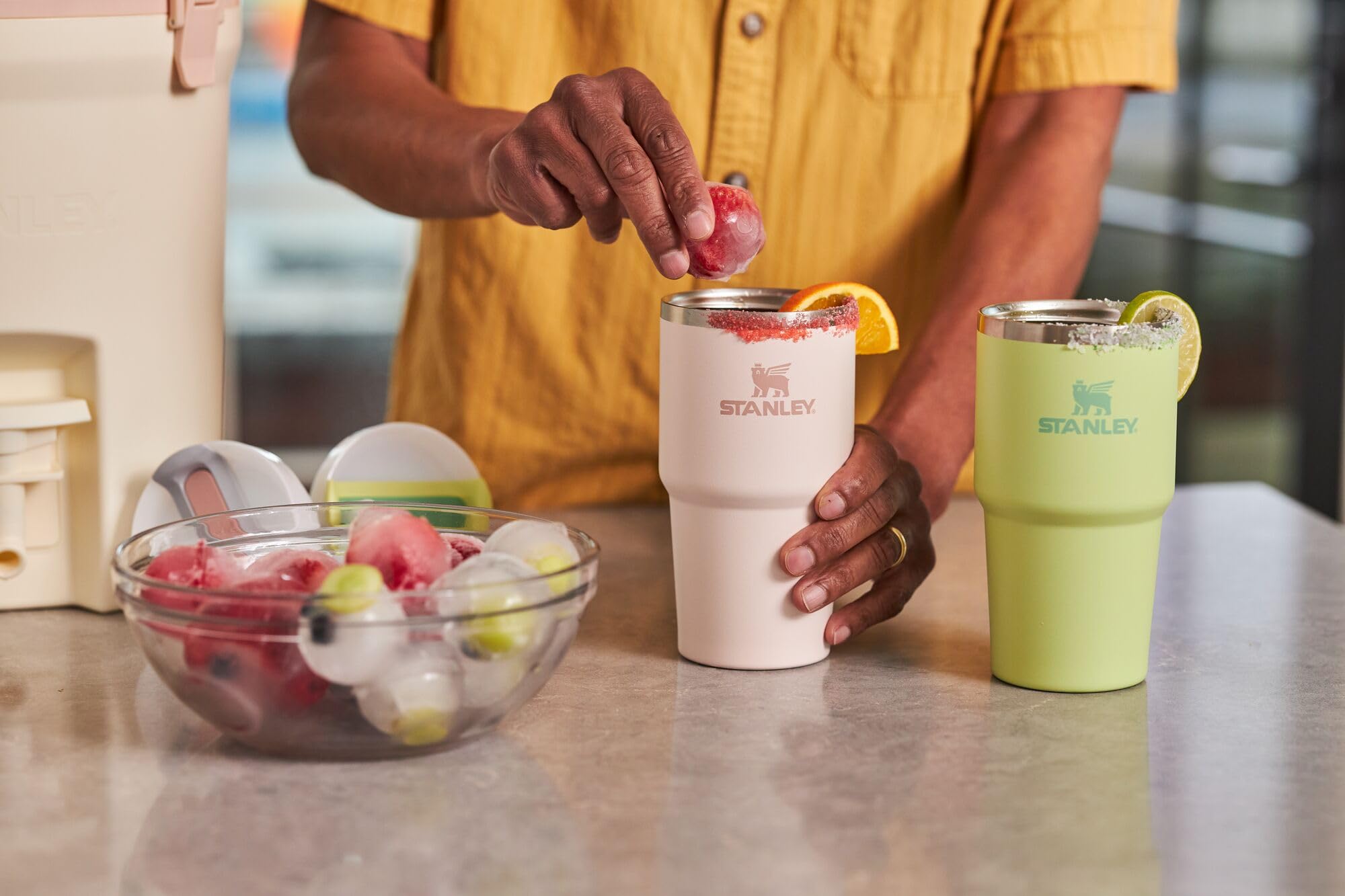 STANLEY Quencher placed in gym bag illustrating travel-ready hydration convenience