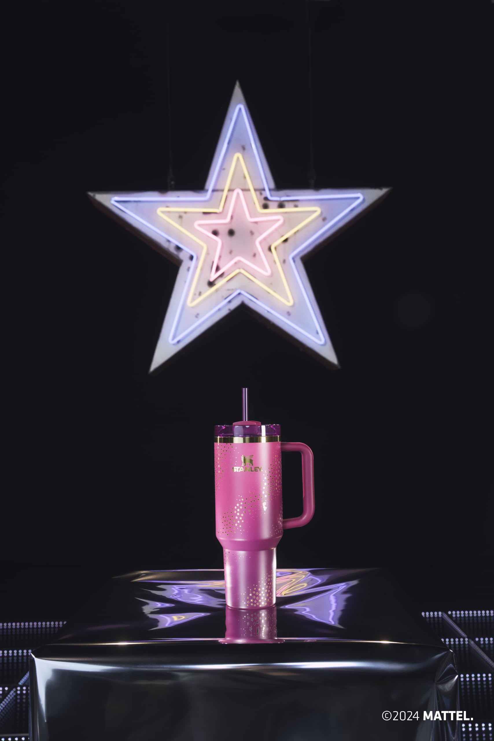 STANLEY beside everyday items showing 40 oz scale for long-lasting hydration