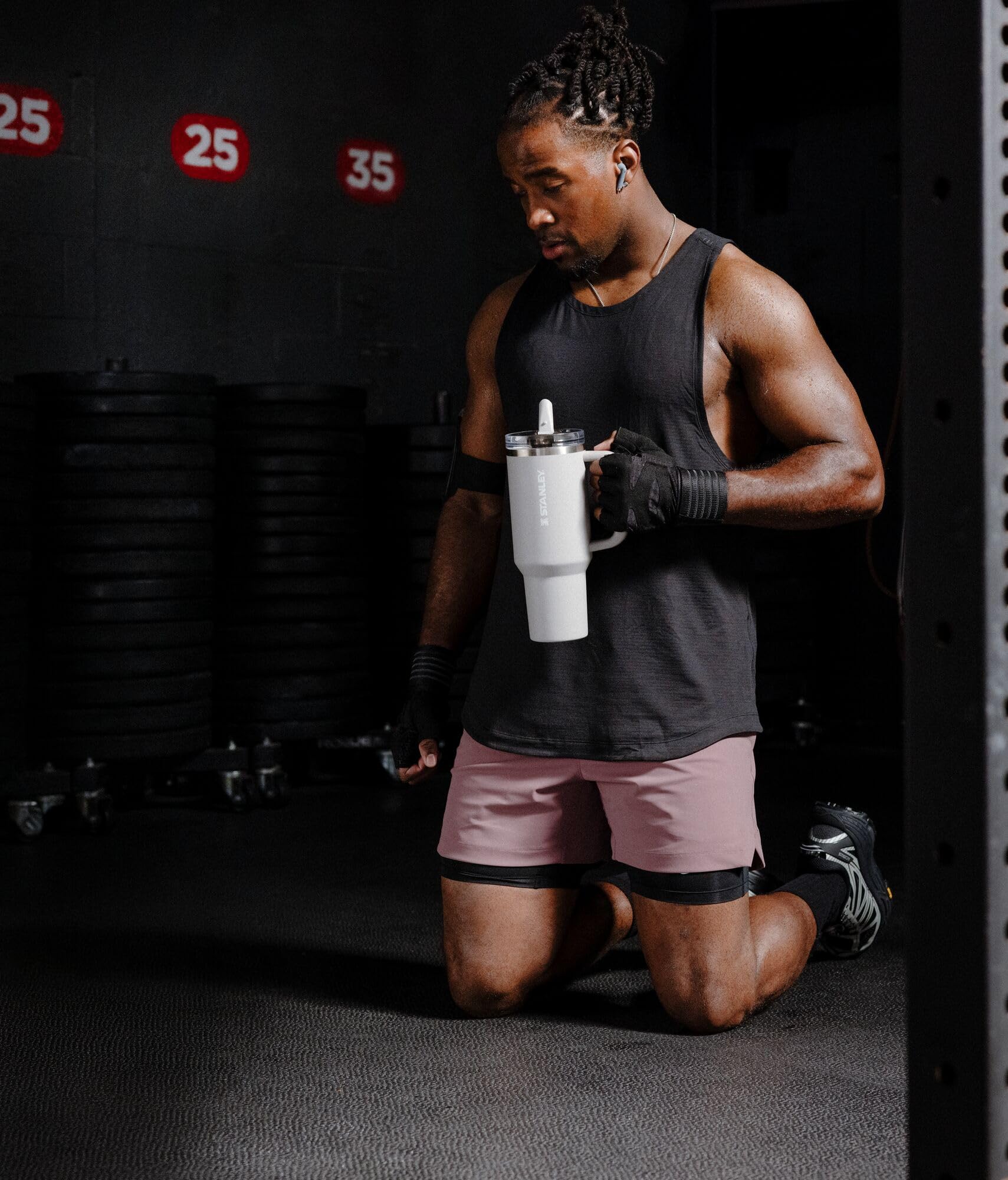 STANLEY tumbler in outdoor scene with backpack, ideal for hikes and active days