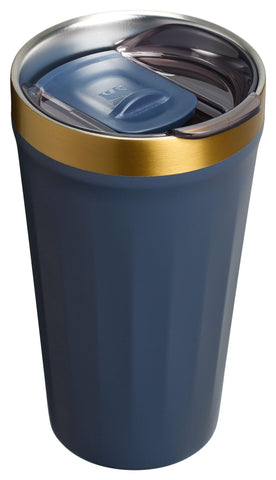 STANLEY 16 oz tumbler next to a smartphone showing compact size