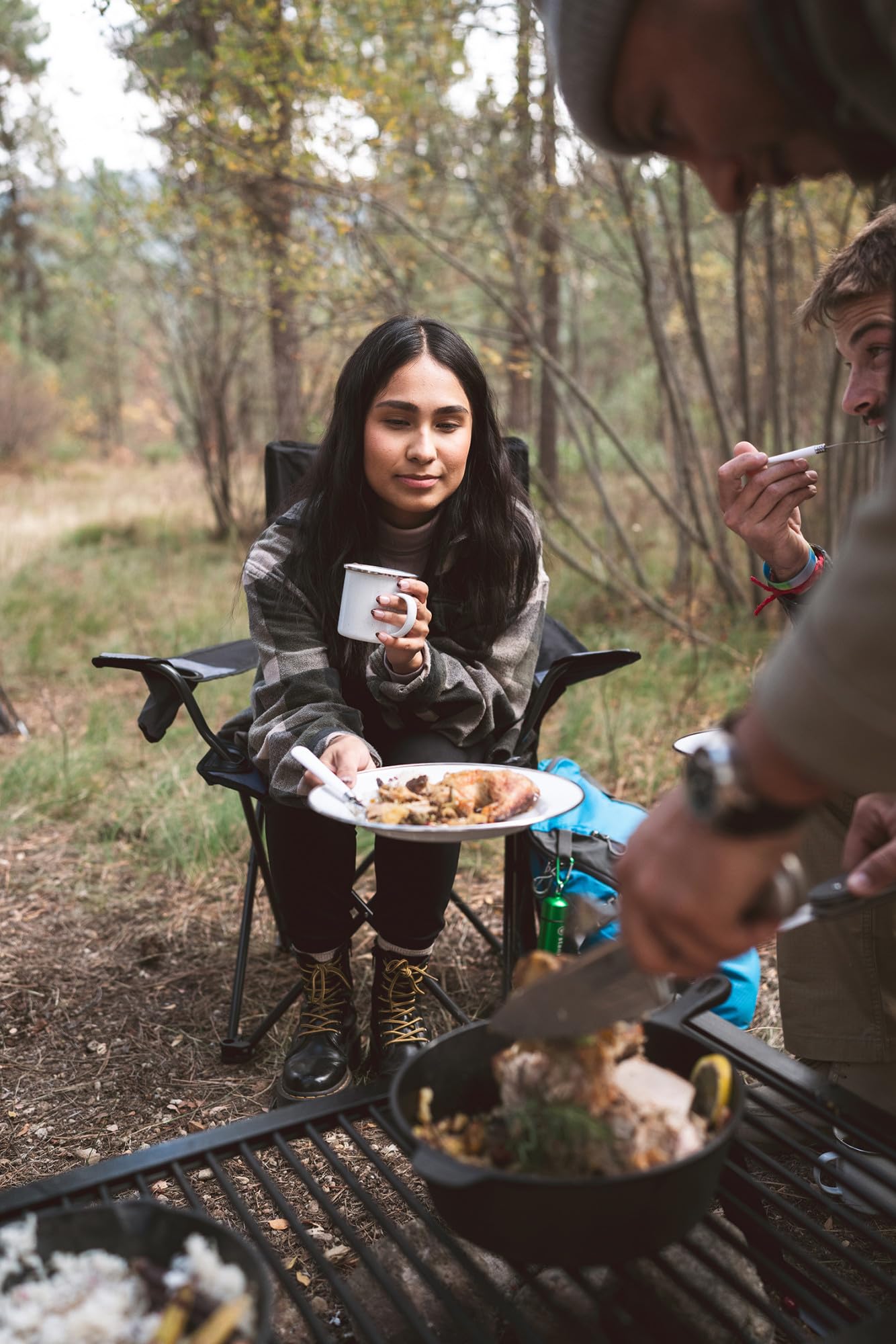 Stansport mug with coffee outdoors illustrating heat-holding and camping comfort