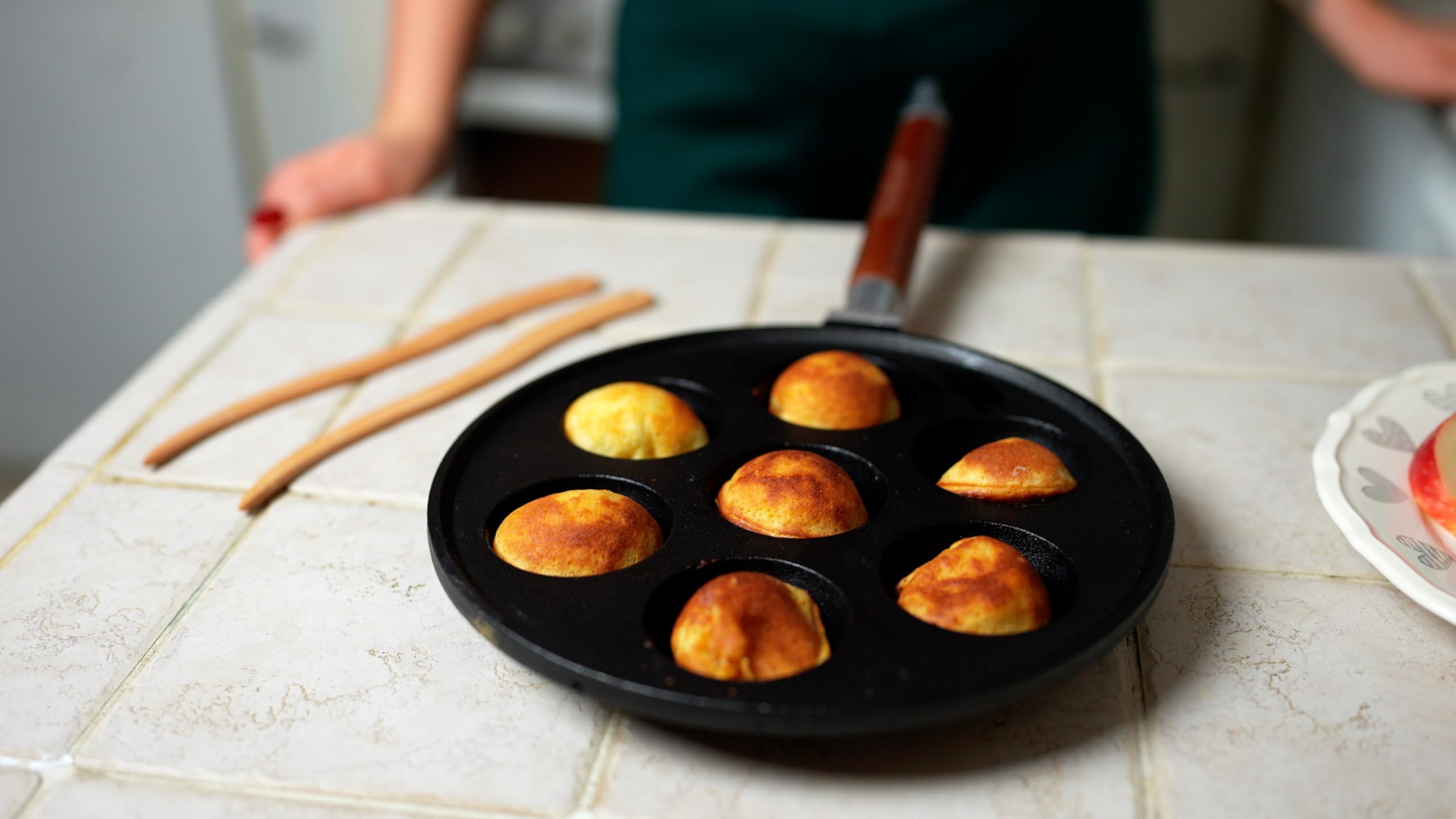 StarBlue plated aebleskiver in breakfast setting showcasing serving appeal
