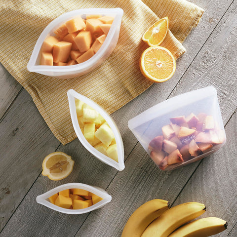 Stasher clear 6-cup bowl filled with salad so contents are visible for easy meal prep