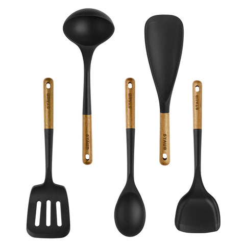 STAUB 5-piece set front view shows sleek black silicone and acacia handles for stylish durability