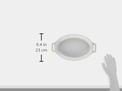 STAUB oval dish in oven with casserole demonstrating high-heat oven safety