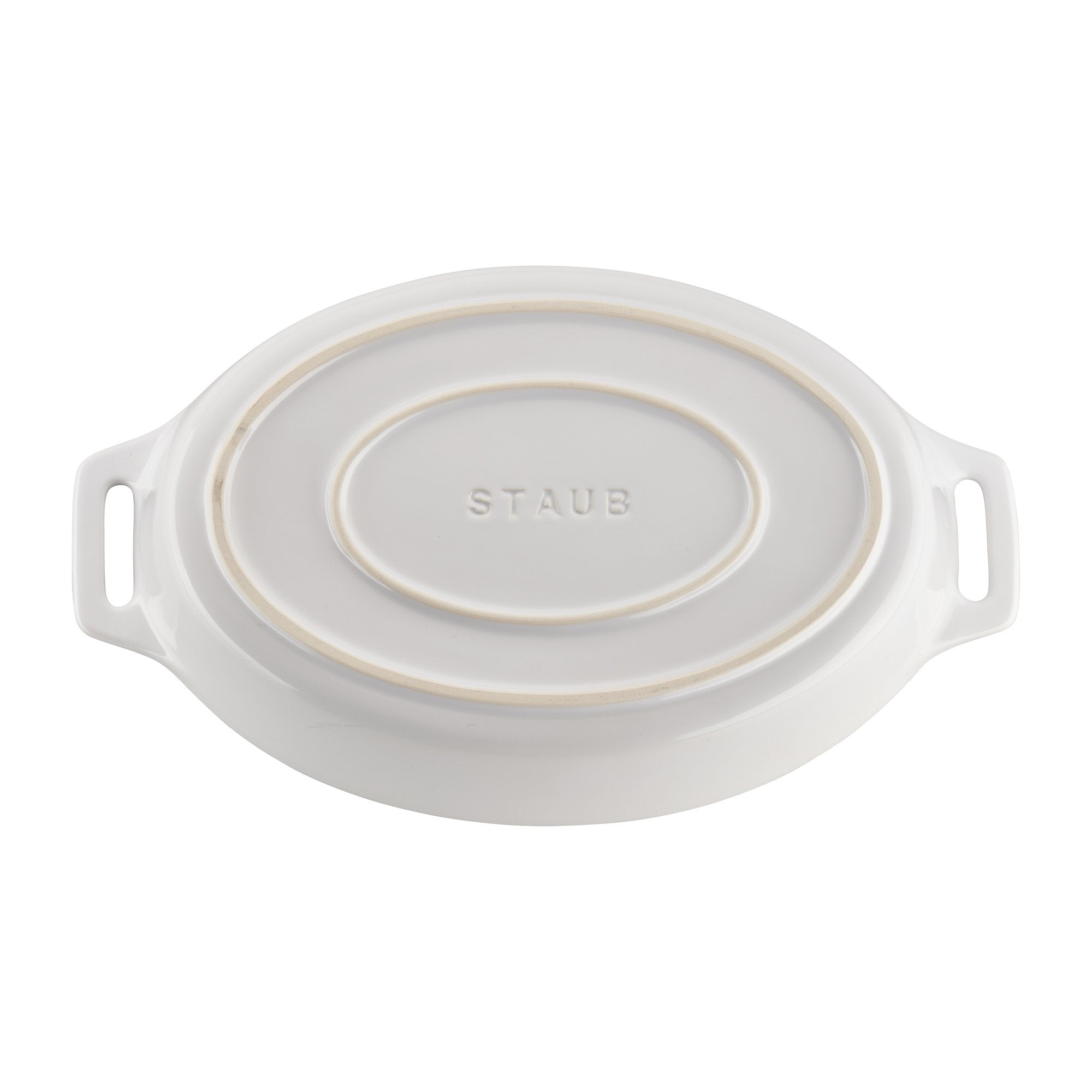 STAUB underside label visible showing brand design and manufacturing detail