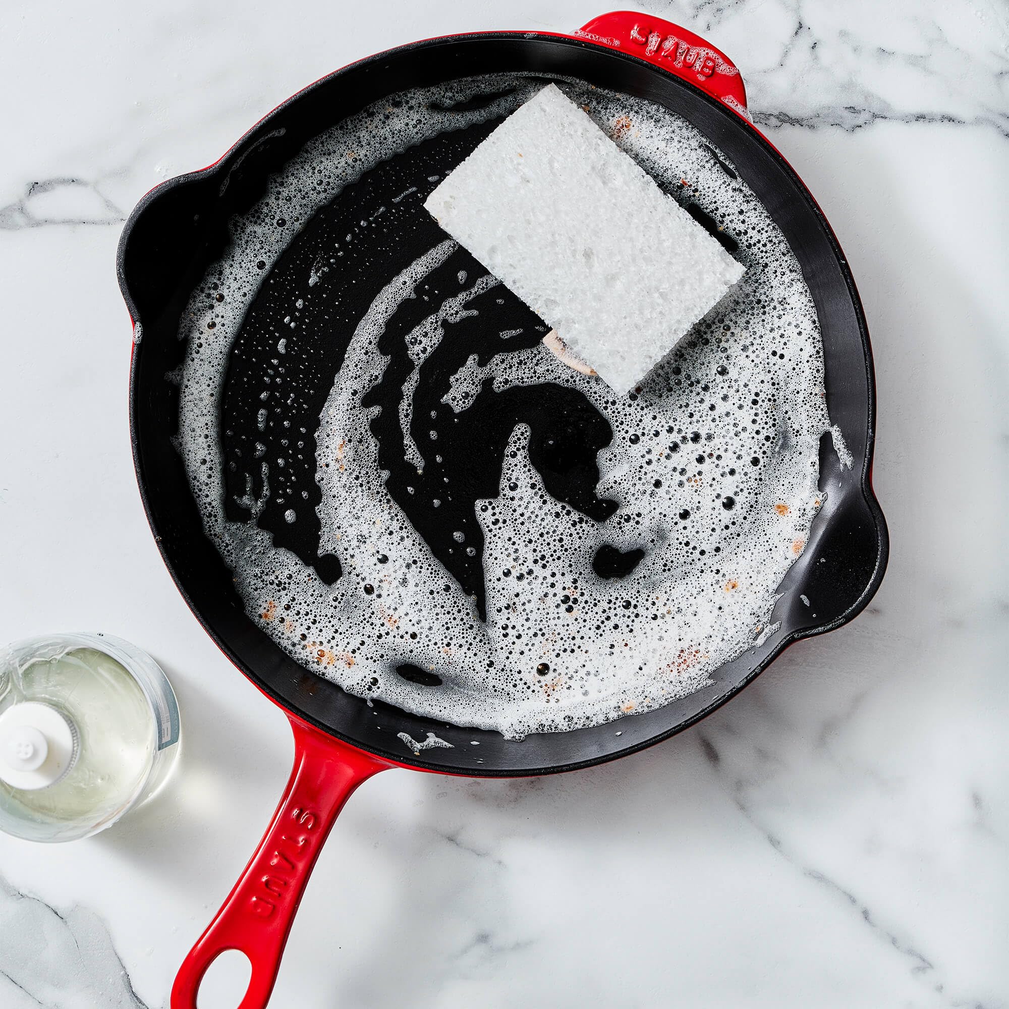 Staub smooth enamel bottom shown suited for induction and all cooktops benefit