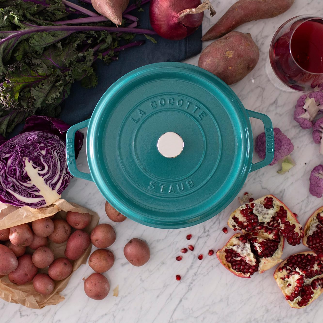 STAUB smooth enamel bottom shown, compatible with induction and even heating