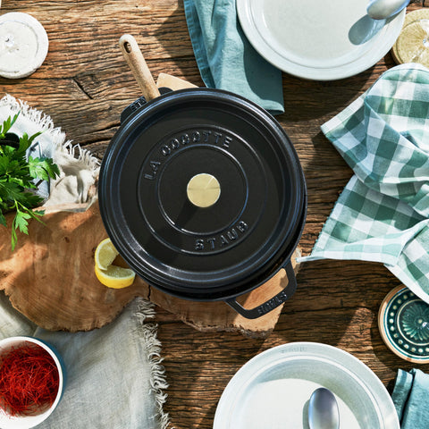 STAUB cocotte simmering on stovetop illustrating even heat retention and versatility
