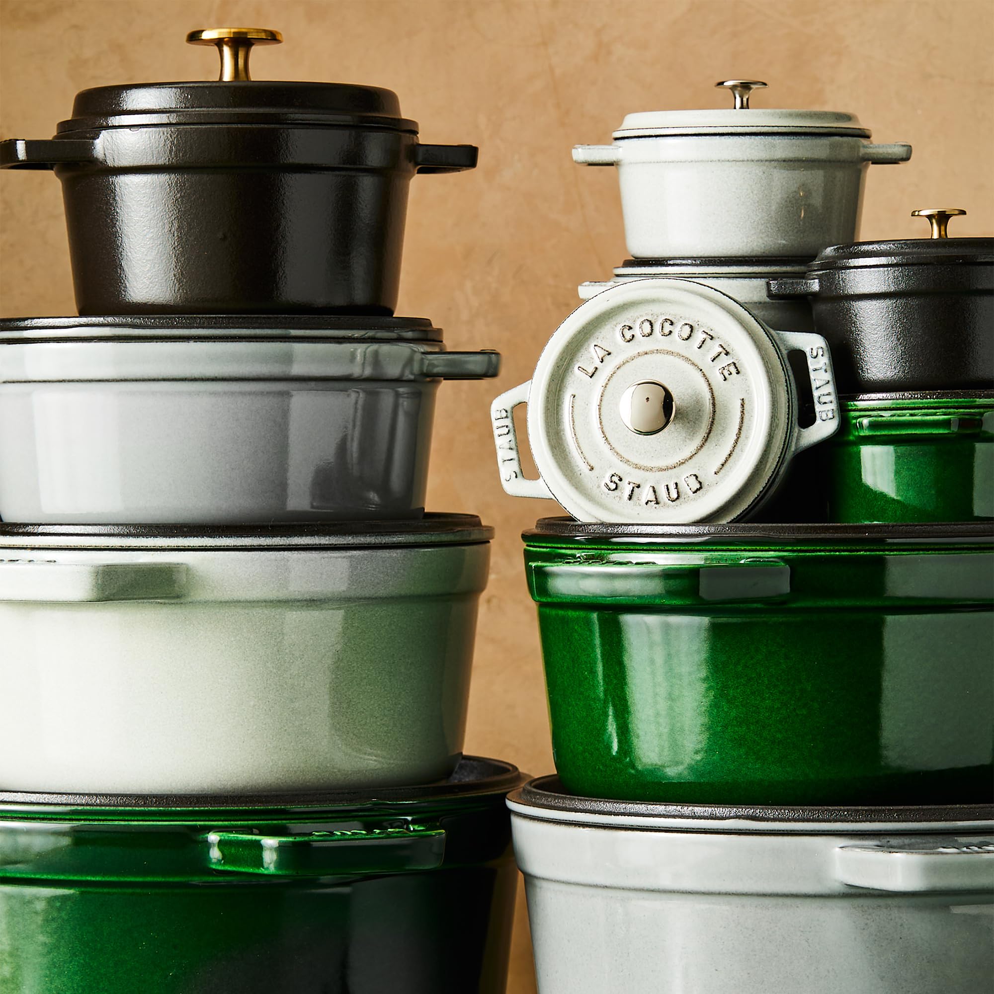 STAUB cocotte cooking on induction stove showing even heat retention benefit