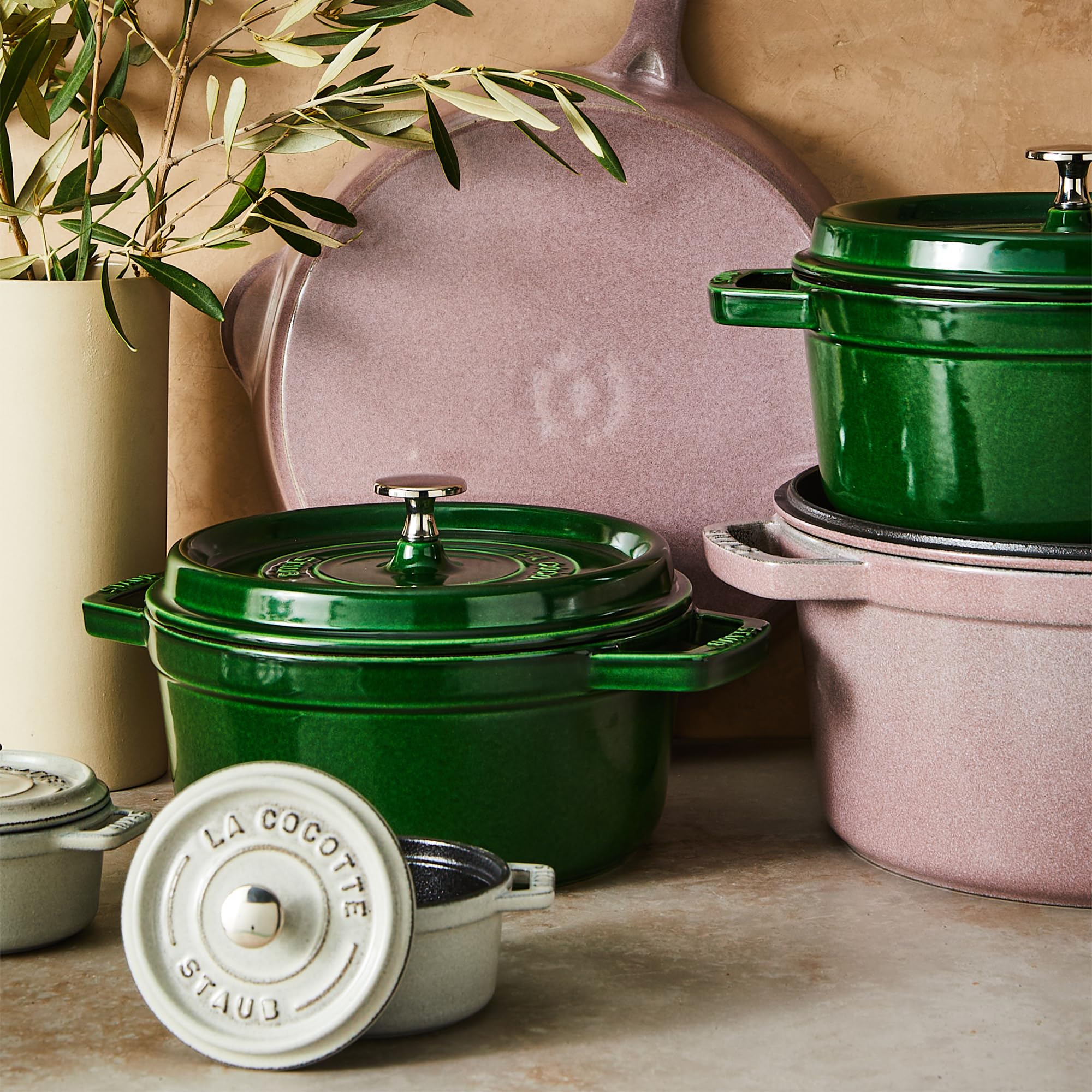 STAUB size comparison with ladle showing 4‑quart capacity and portion guidance