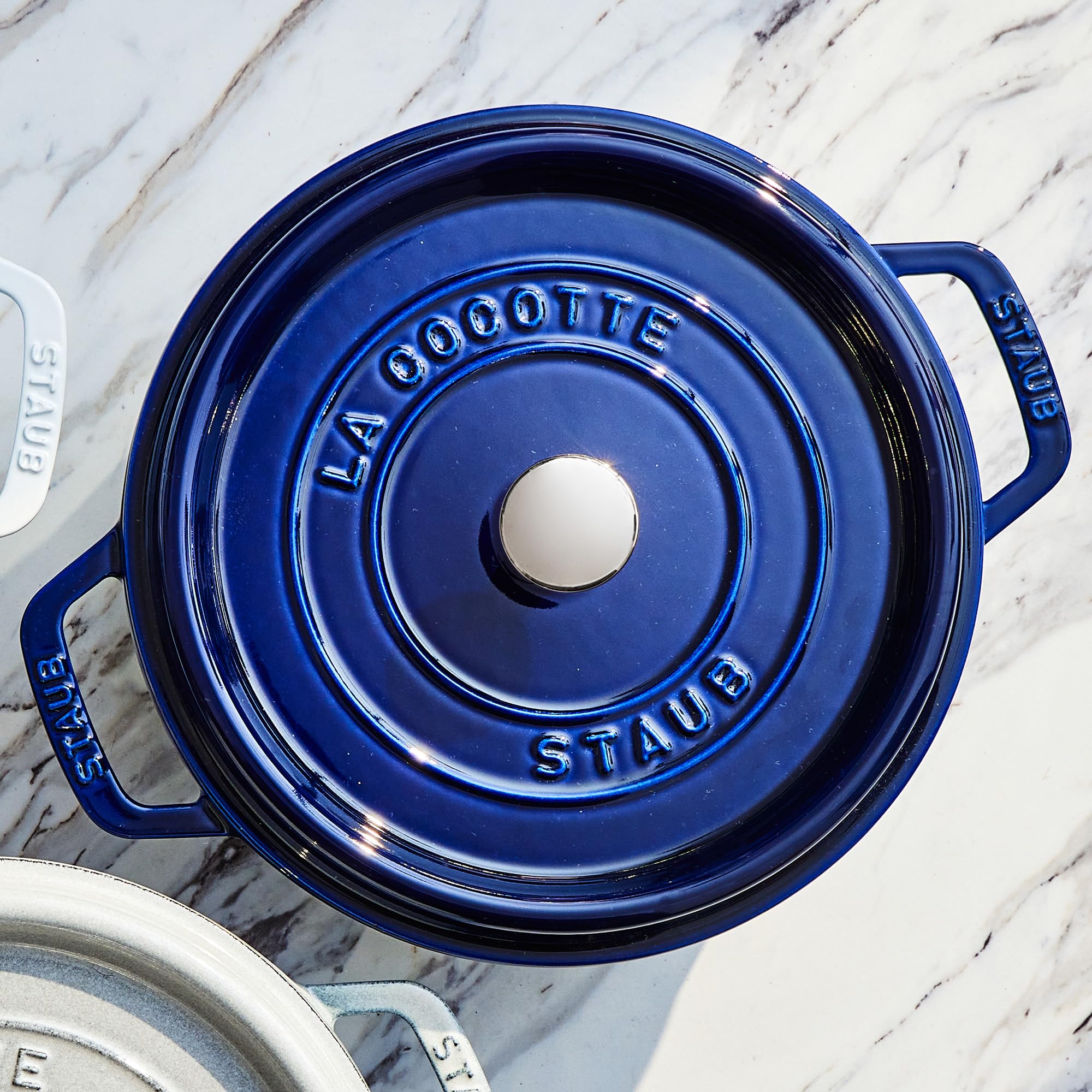 STAUB lid spikes close-up showing self-basting design for juicier results