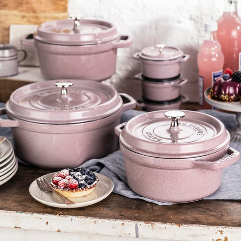Staub cocotte handle close-up showing sturdy grip and safe handling