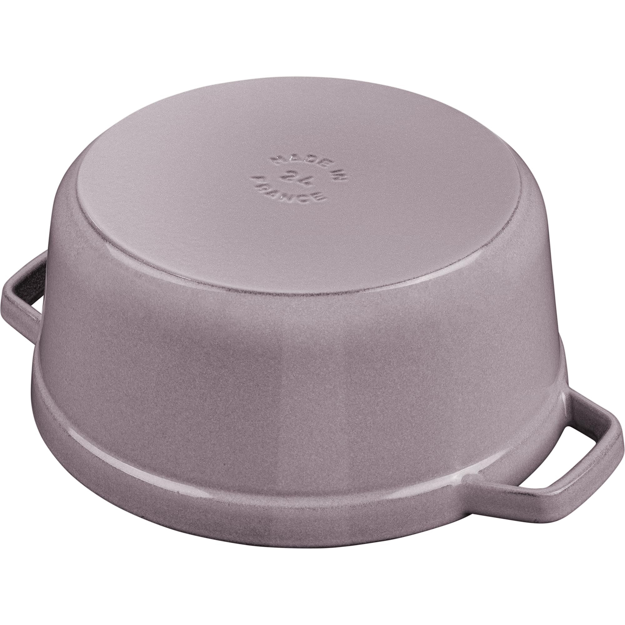 Staub matte-black interior close-up showing browning surface and no seasoning needed