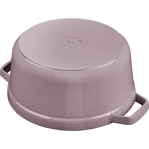Staub matte-black interior close-up showing browning surface and no seasoning needed