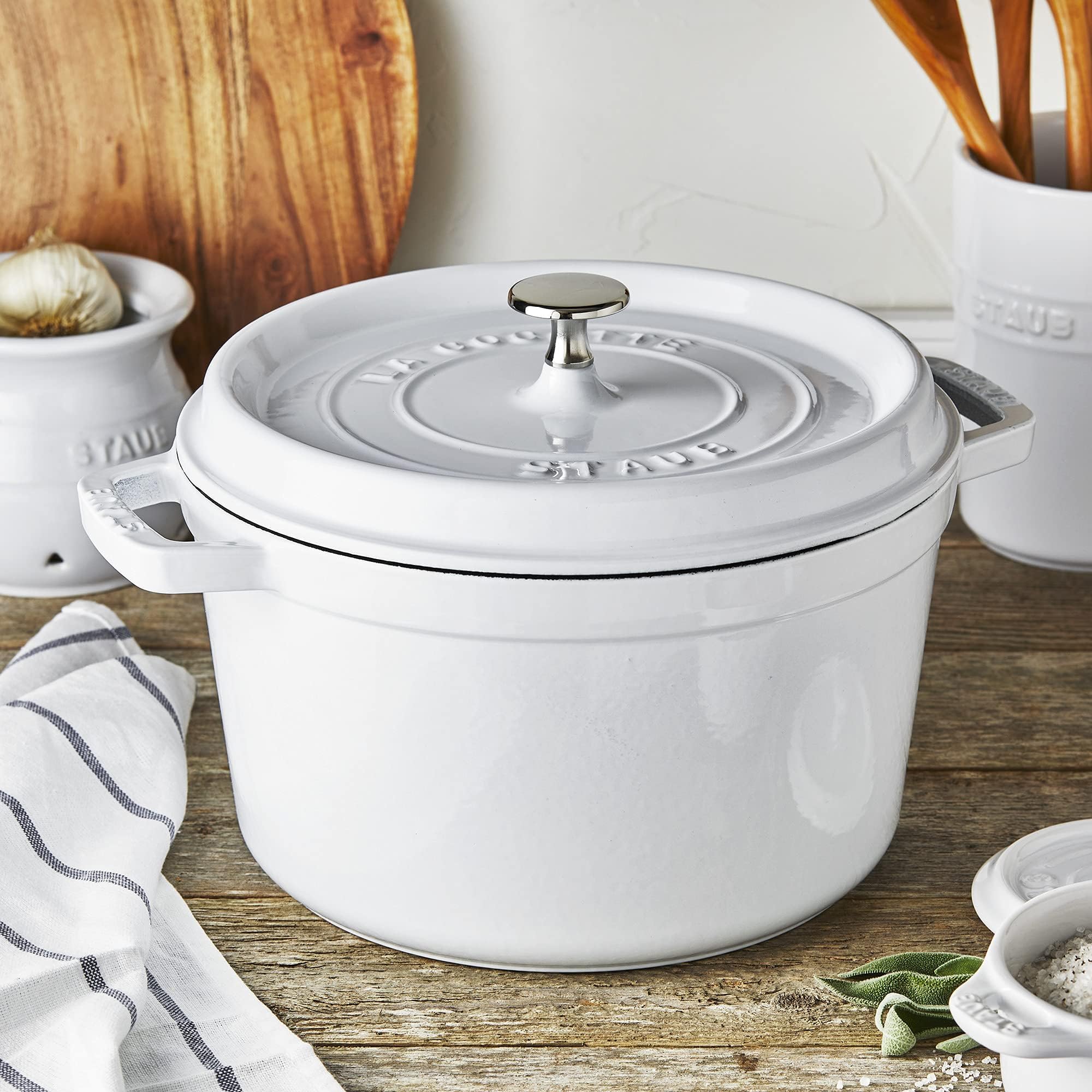 STAUB cocotte cooking on induction cooktop showing compatibility benefit for all stovetops