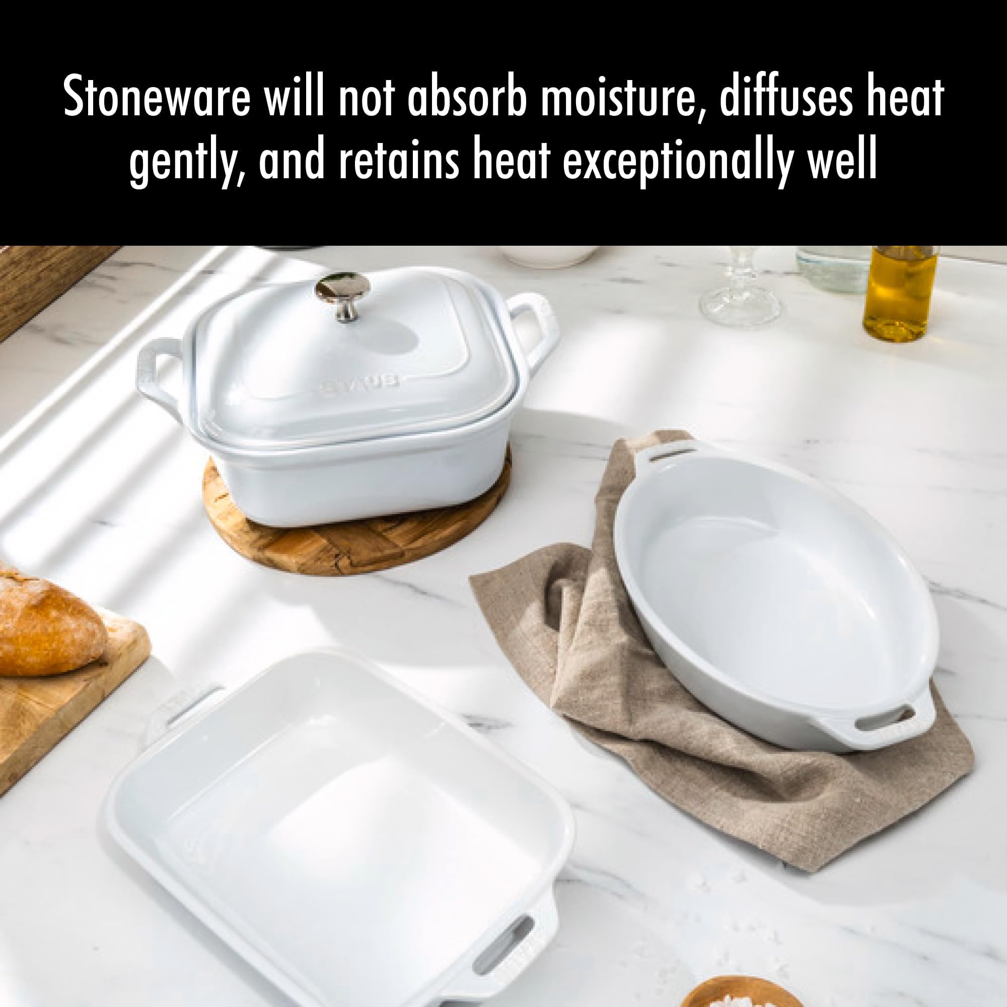 STAUB set on table styled for serving to highlight oven-to-table use