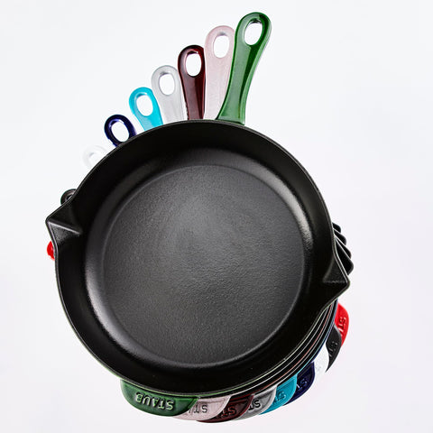 STAUB pan beside spoon showing scale and ideal two-to-three person capacity benefit