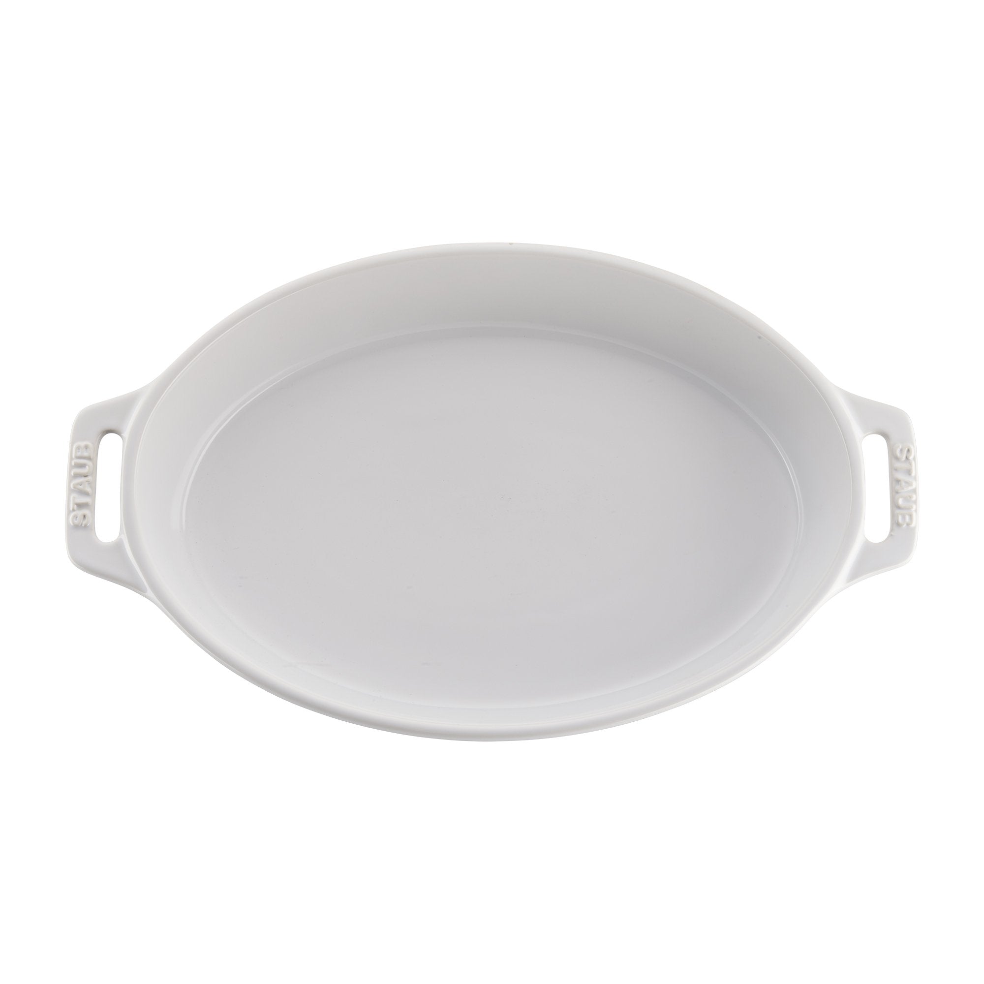 STAUB dish beside utensils showing scale and portioning convenience
