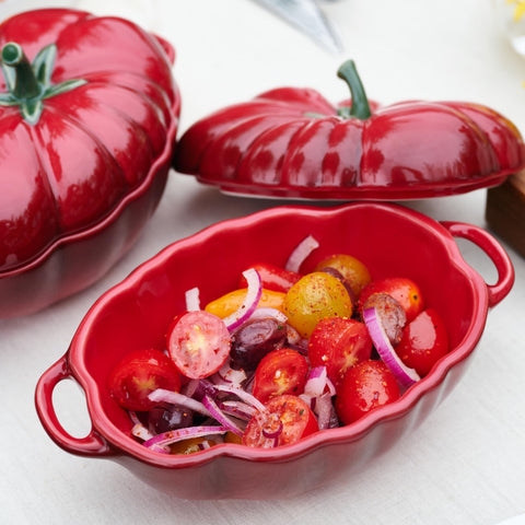 Staub tomato cocotte side profile showing silhouette, decorative table appeal benefit