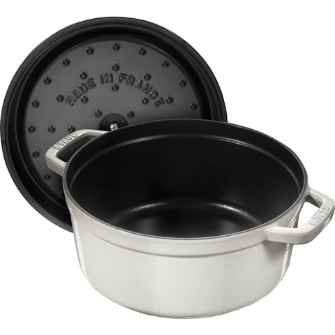 STAUB in oven with simmering stew showing oven-safe cooking versatility