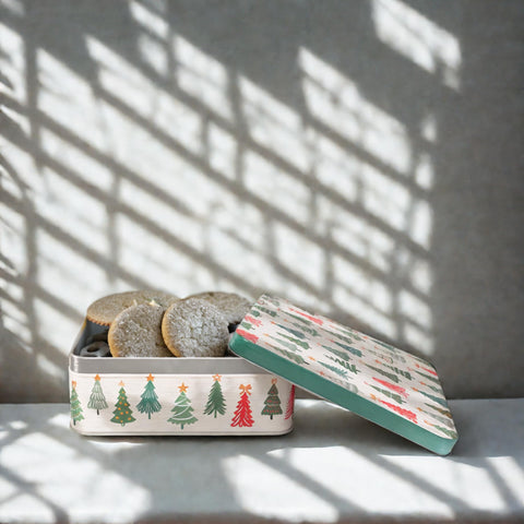 STEEL MILL AND CO. tins arranged on a kitchen counter in holiday scene