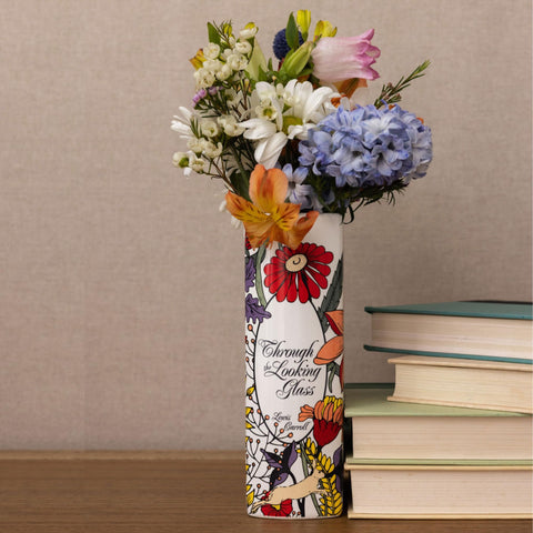 Steel Mill & Co. vase on a bookshelf blending with books for literary styling benefit