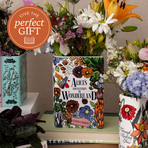 Steel Mill & Co. book vase in use with fresh flowers adding storybook charm