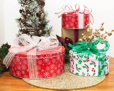 Steel Mill & Co. tins arranged on holiday table with baked goods, decorative seasonal display