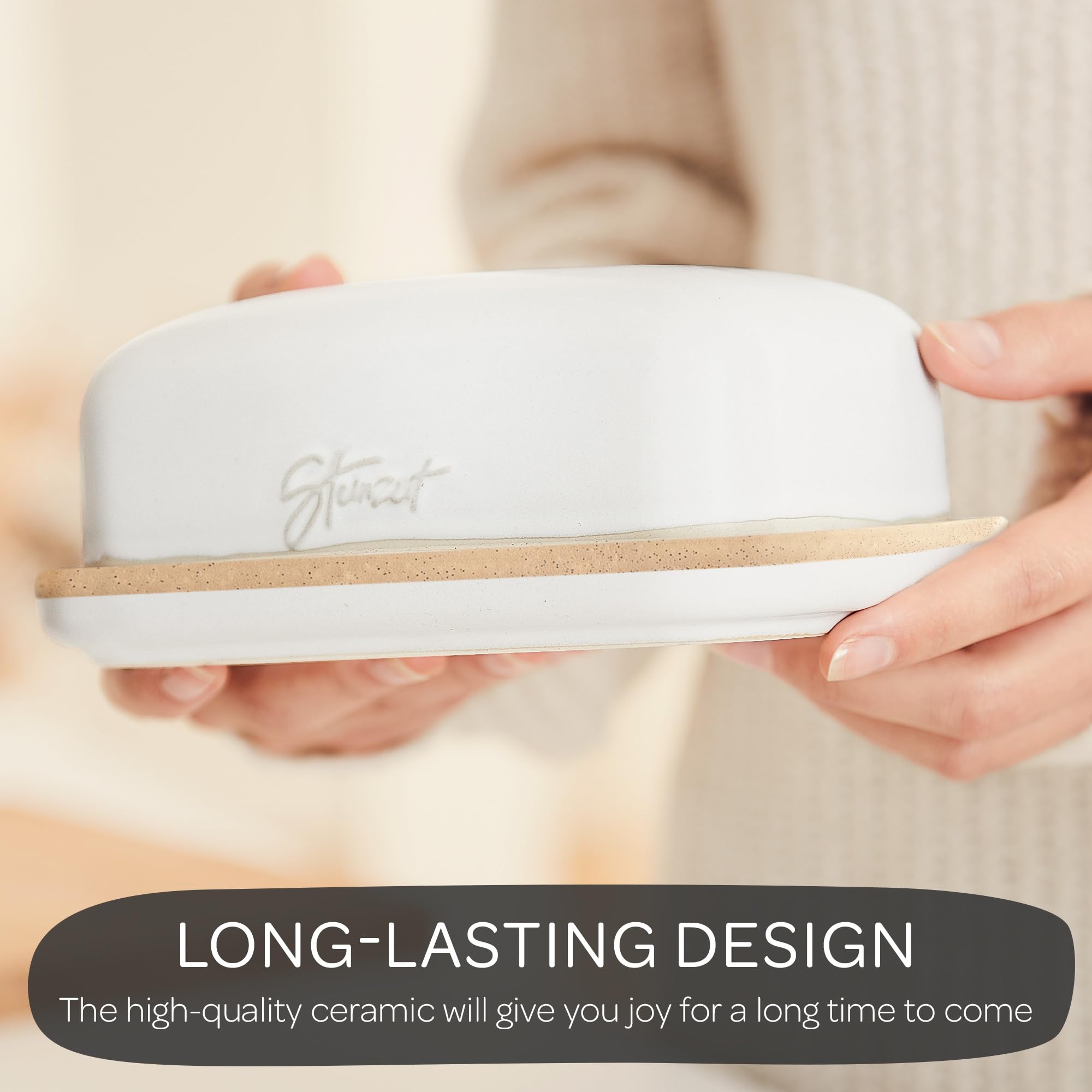 Steinzeit butter dish next to knife showing scale and countertop stability benefit
