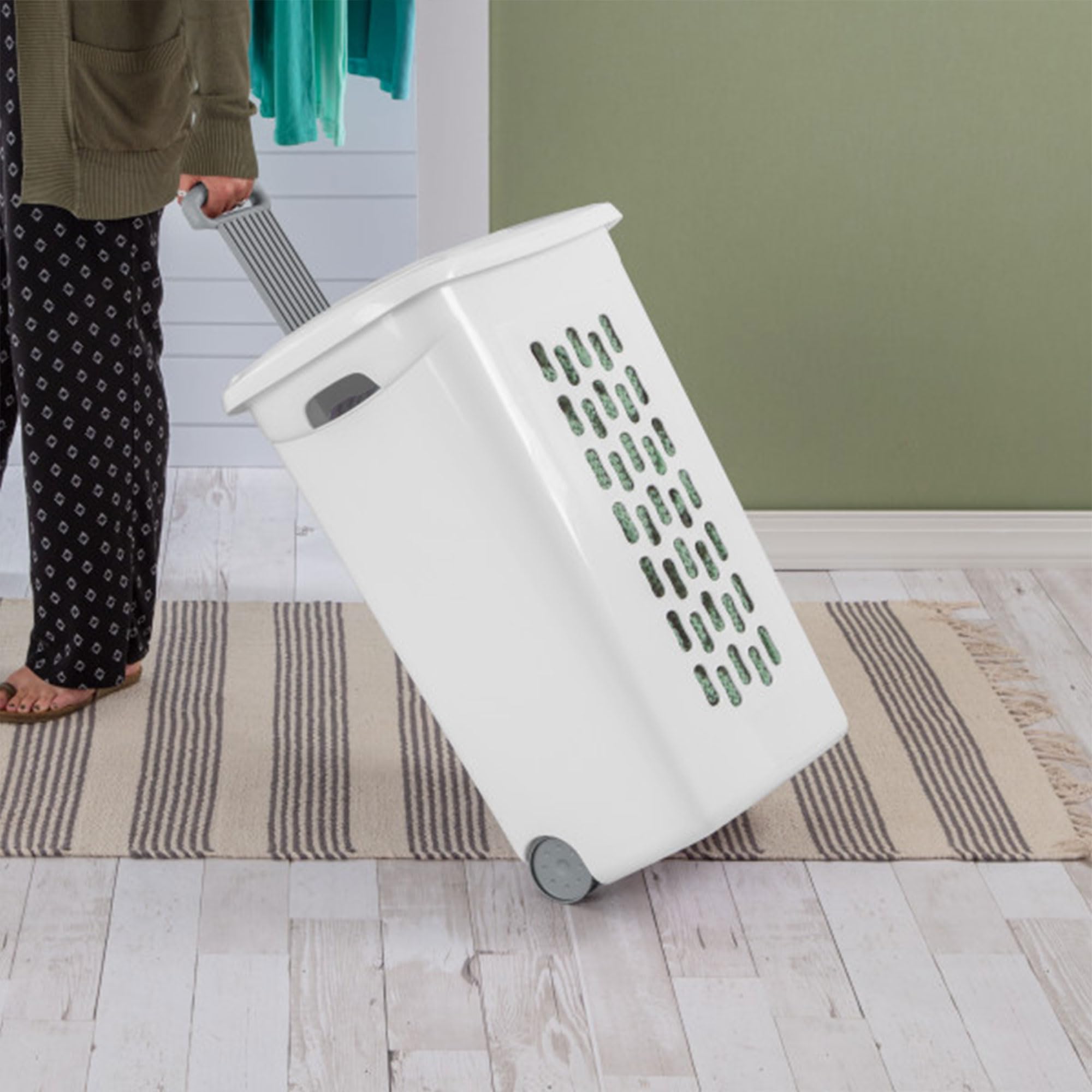 Sterilite hamper lifted by side handles for comfortable carrying