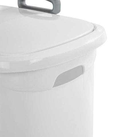Sterilite hamper next to laundry basket showing family-sized capacity