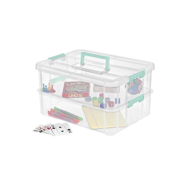 Sterilite stacked boxes on shelf for organized seasonal storage