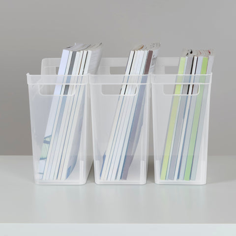 Sterilite narrow shelf bin on shelf alongside books to show size and fit