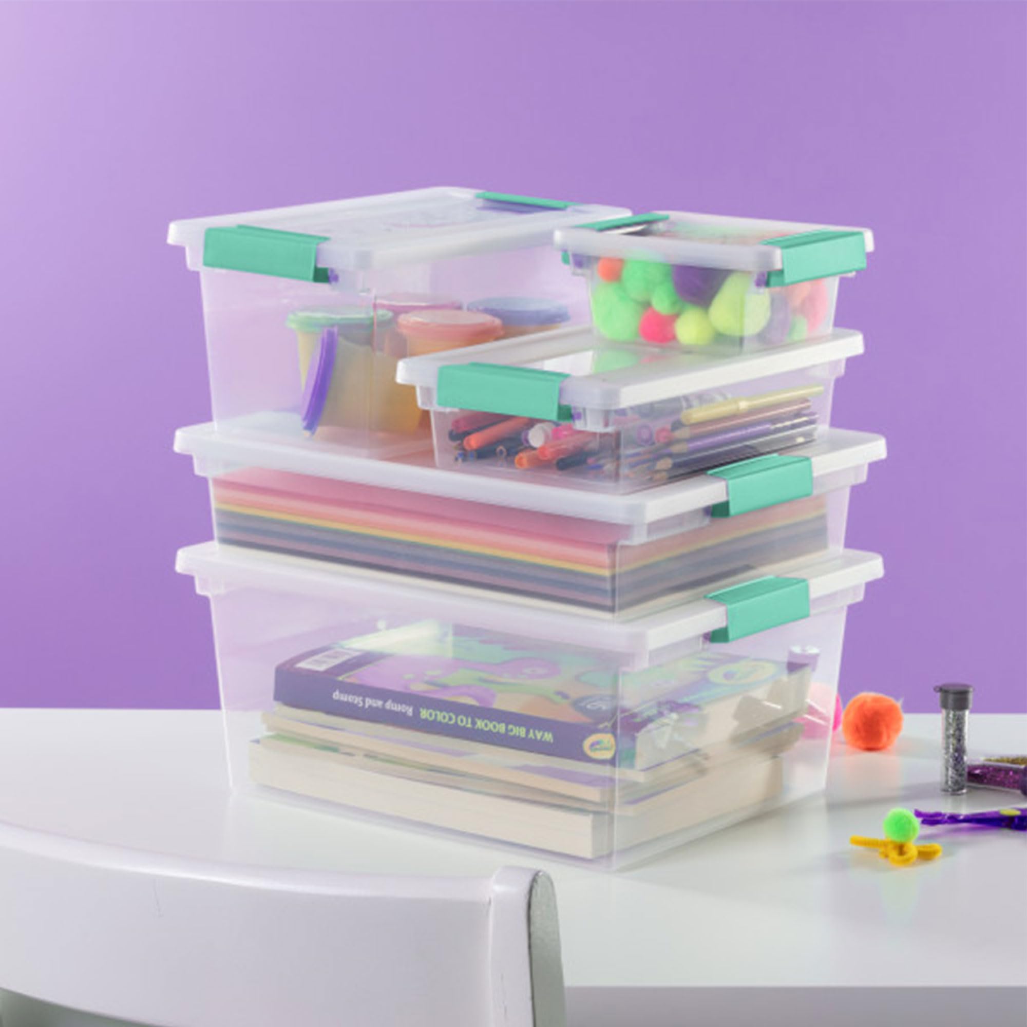 Sterilite box inside a drawer showing scale and fit for narrow storage spaces