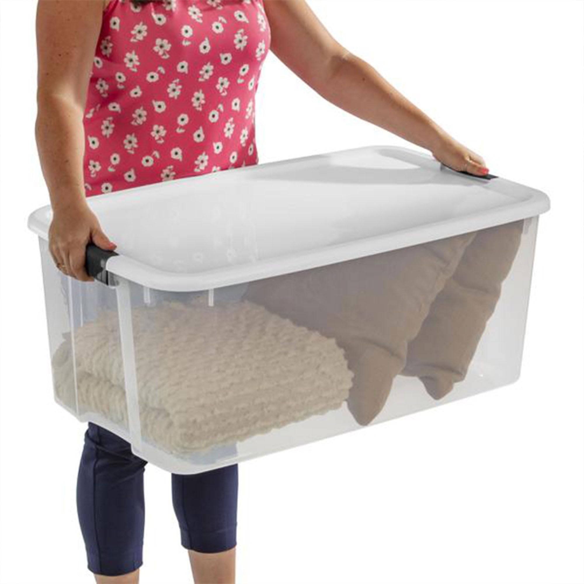 Sterilite bin beside a chair showing scale and large 116-quart capacity advantage