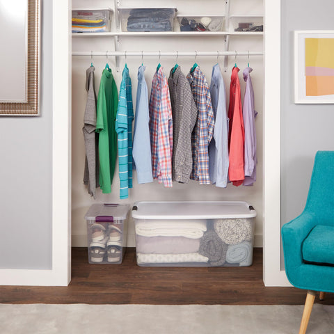 Sterilite stacked bins inside a closet illustrating space-saving vertical organization