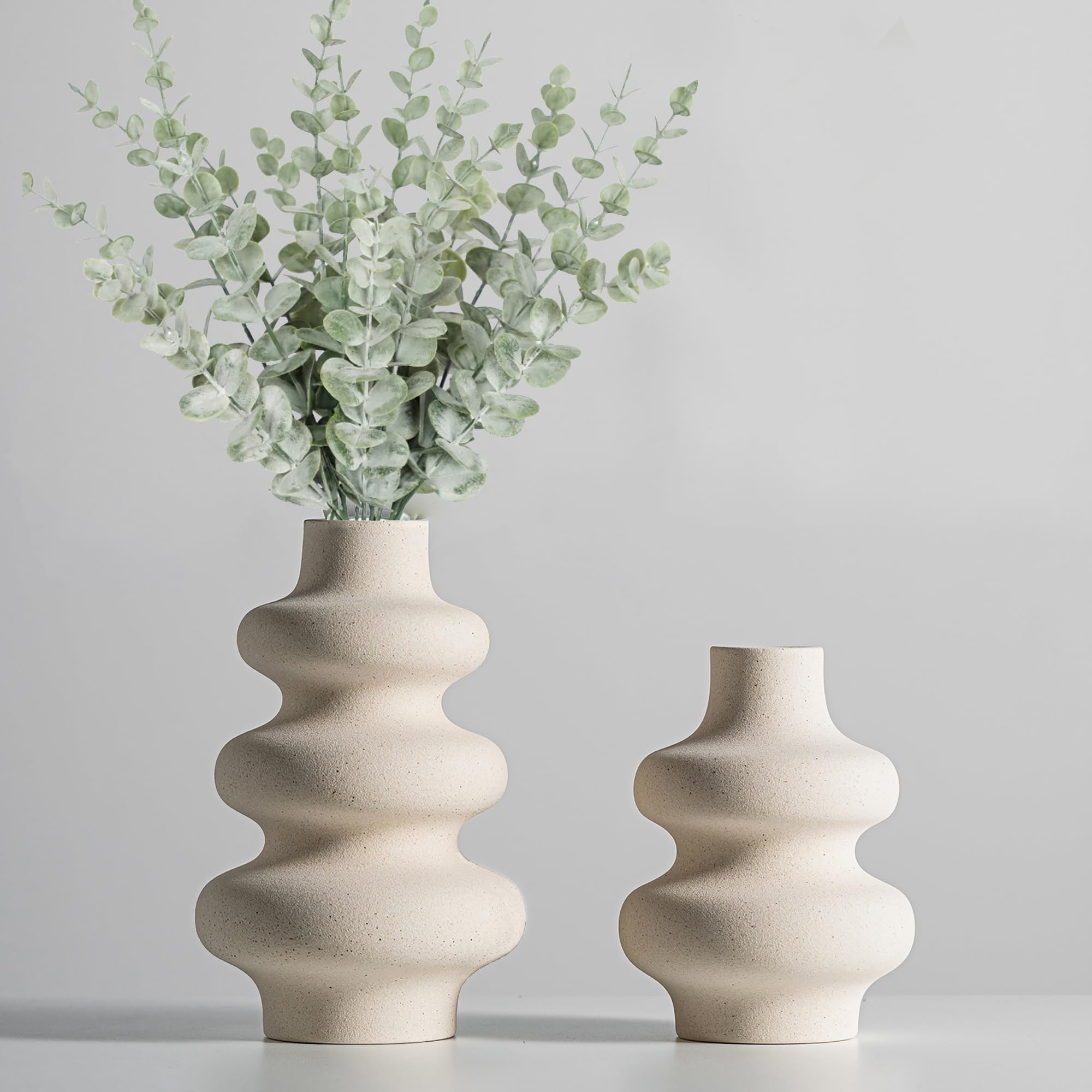 Steviieden front view of both off-white vases showing sculptural benefit