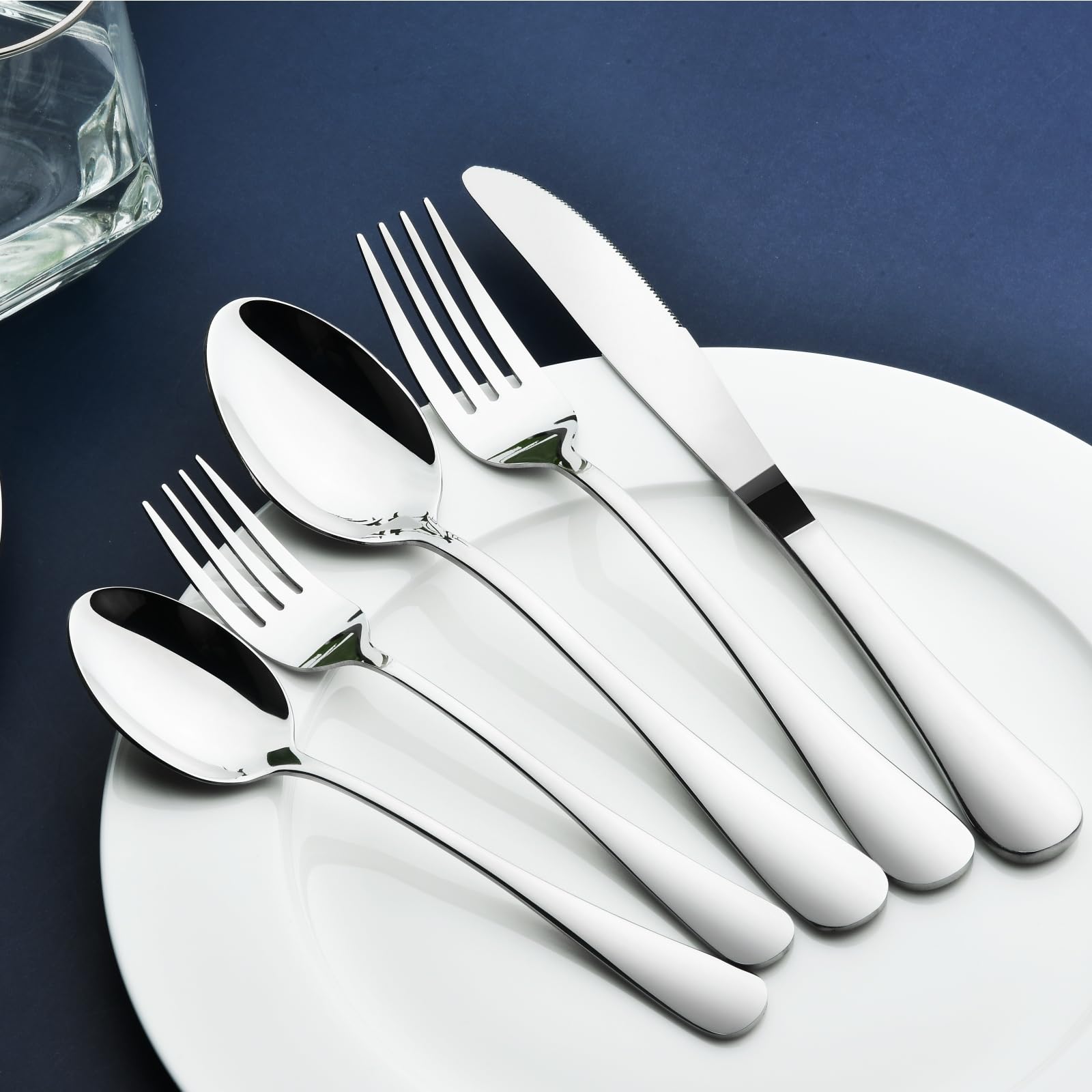 Stilloye handle close-up showing polished stainless finish and ergonomic grip